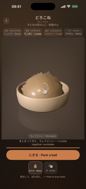 Stirring glossy mud in a ceramic bowl